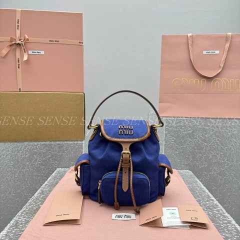 미우미우 캔버스 가죽 백팩 S