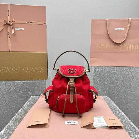 미우미우 캔버스 가죽 백팩 S