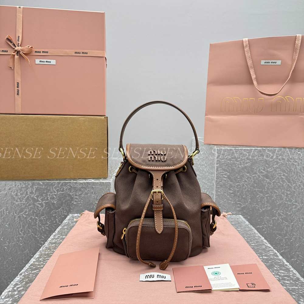 미우미우 캔버스 가죽 백팩 S