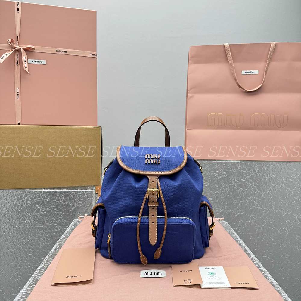 미우미우 캔버스 가죽 백팩 M